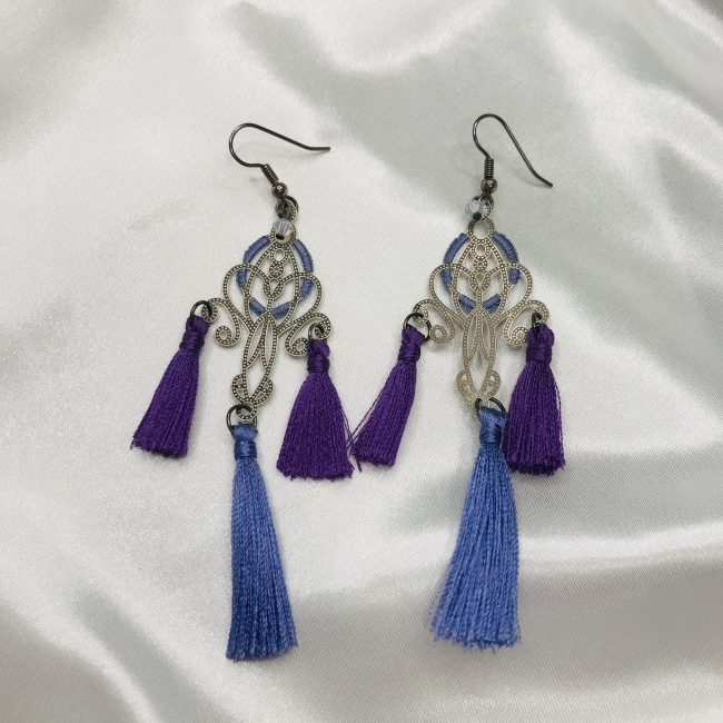 Boucles d'oreilles pompons mauves