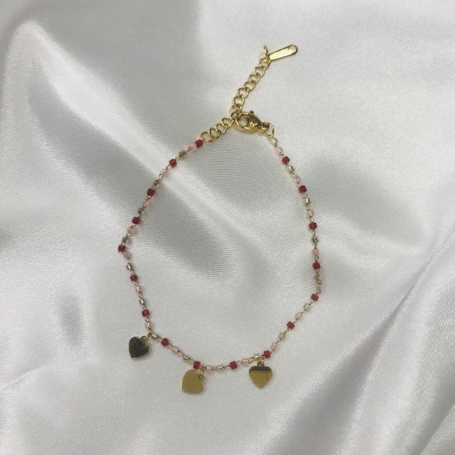 Bracelet rouge, rose et doré