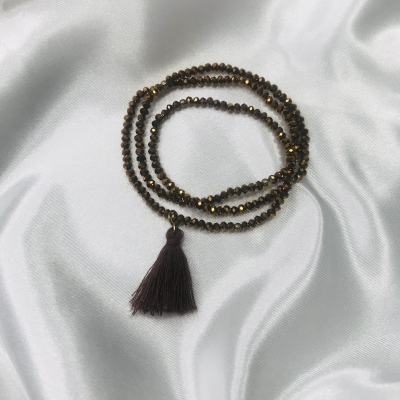 Bracelet de perles en cristal et pompon