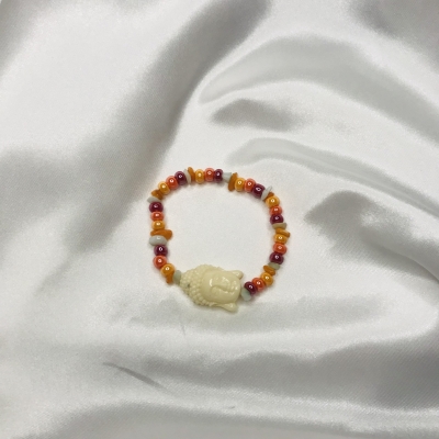 Bracelet en éclats de pierres, perles et boudha