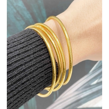 Bracelet bouddhiste fin doré