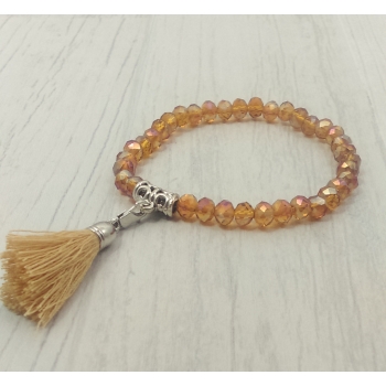 Bracelet ambre en perles de verre et pompon