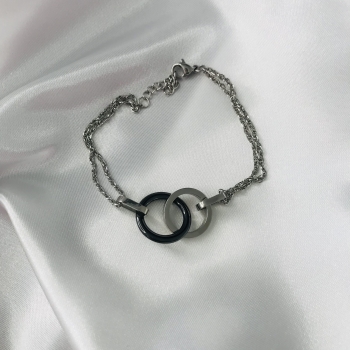 Bracelet en acier et ronds entrelacés céramique noir