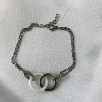 Bracelet en acier et ronds entrelacés céramique blanc