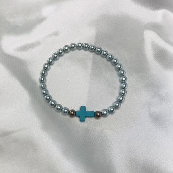 Bracelet en perles bleues et croix turquoise