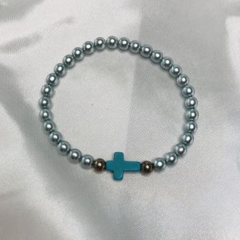 Bracelet en perles bleues et croix turquoise